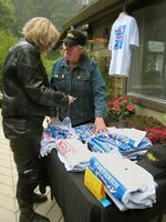 Liz-sells-Carolyn-an-anniversay-T-shirt.jpg